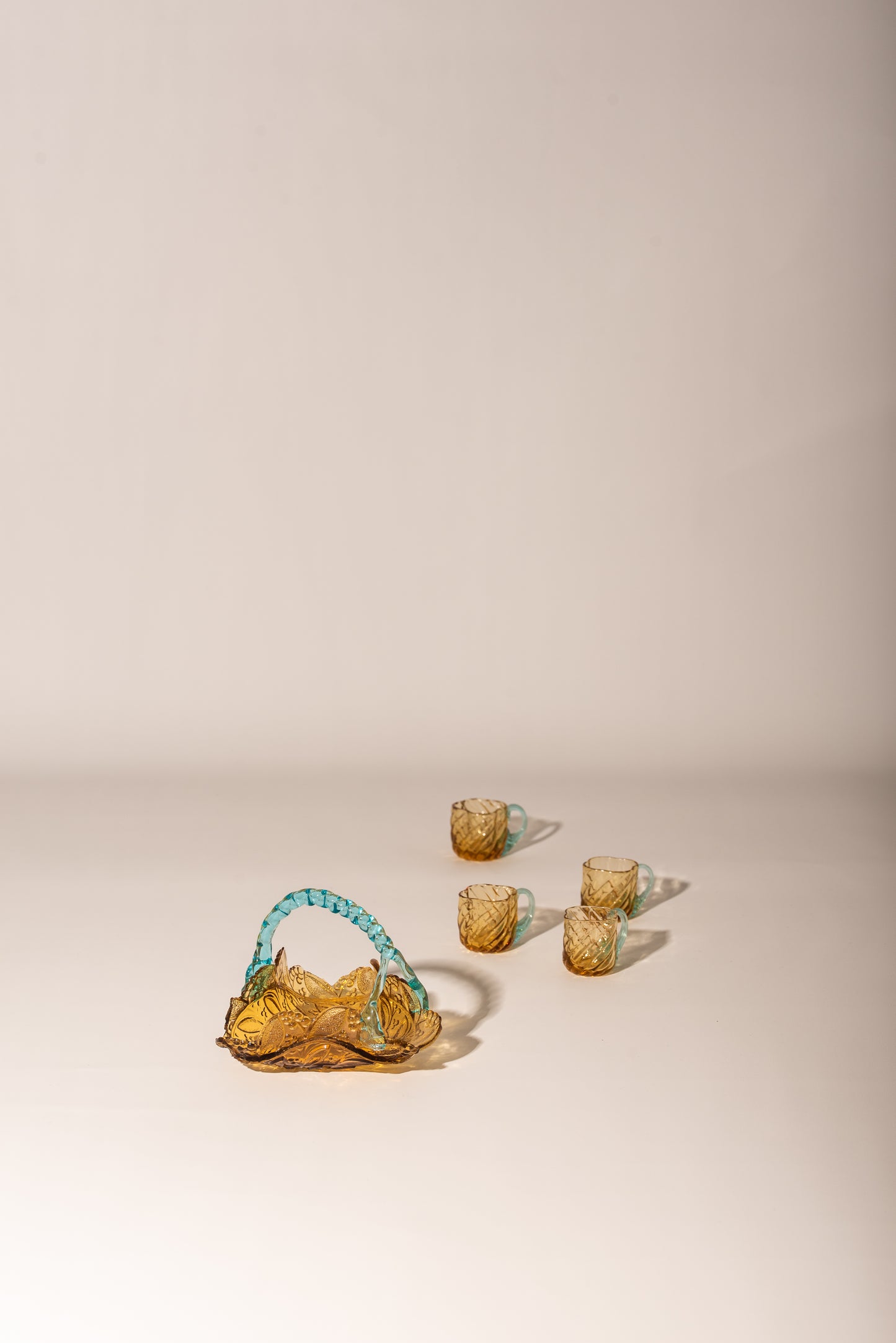 Glass basket and teacups