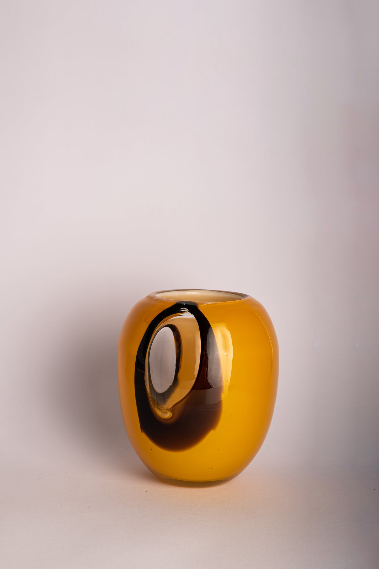 Orange, black and clear glass vase