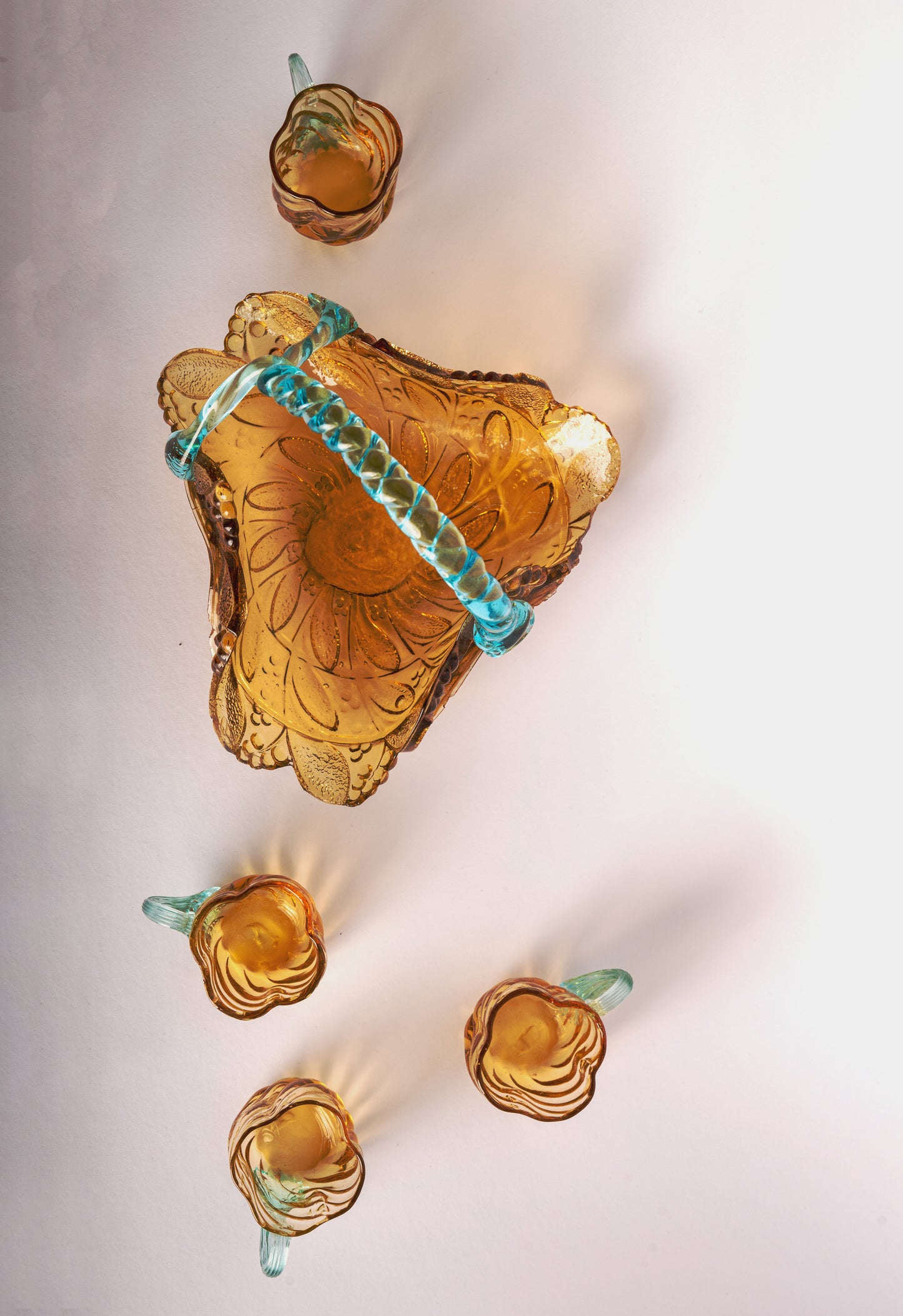 Glass basket and teacups