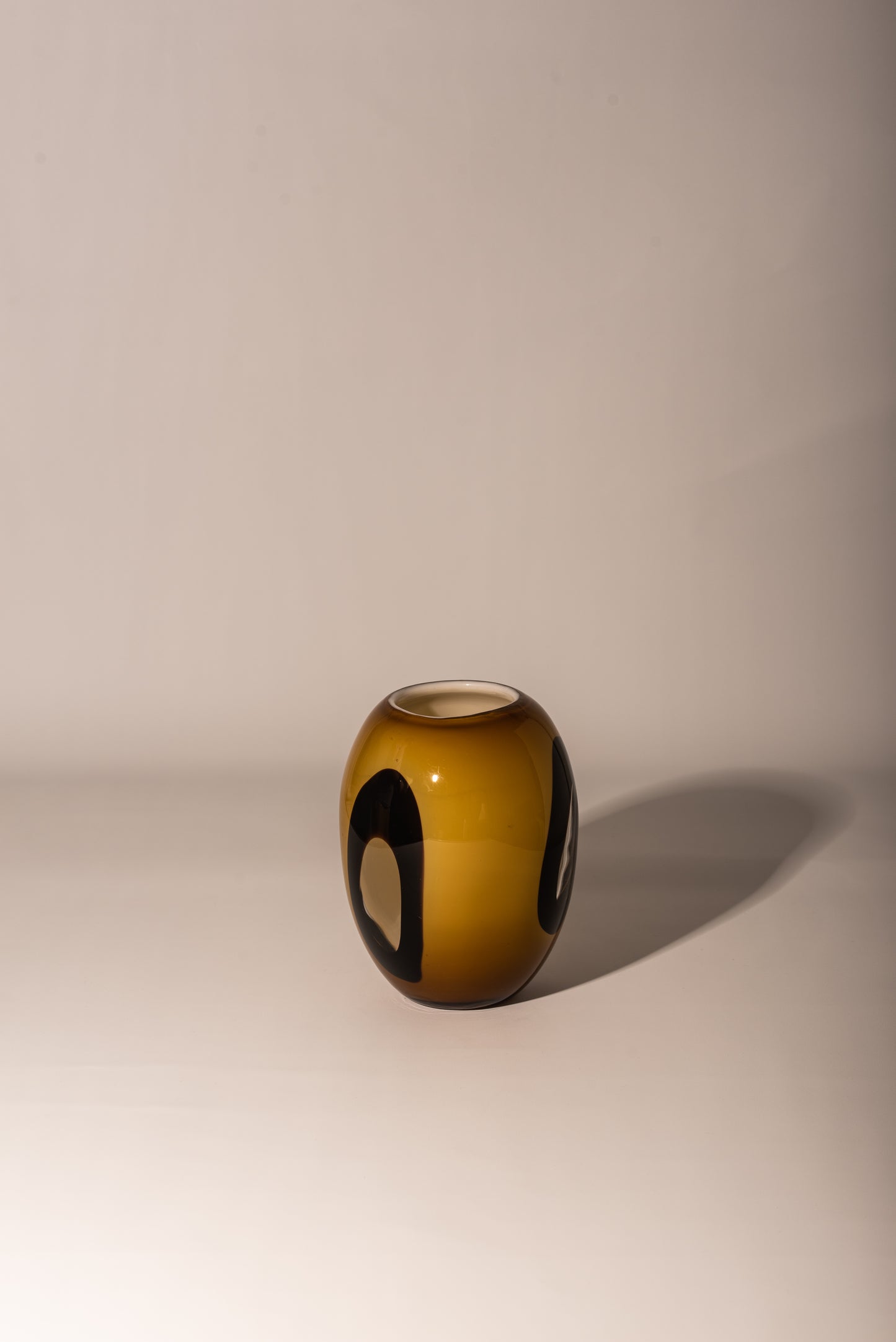 Brown, black and yellow vase