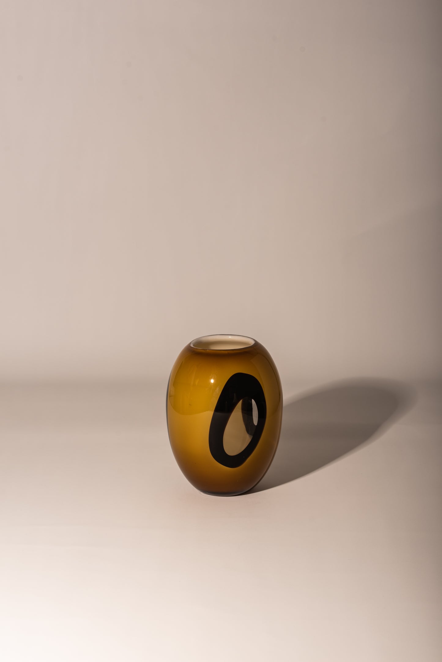 Brown, black and yellow vase
