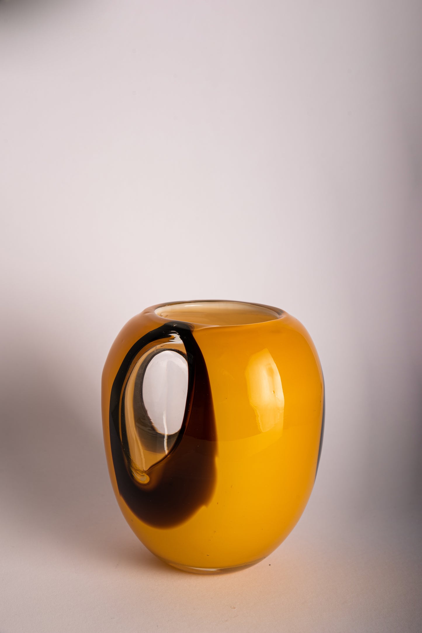 Orange, black and clear glass vase