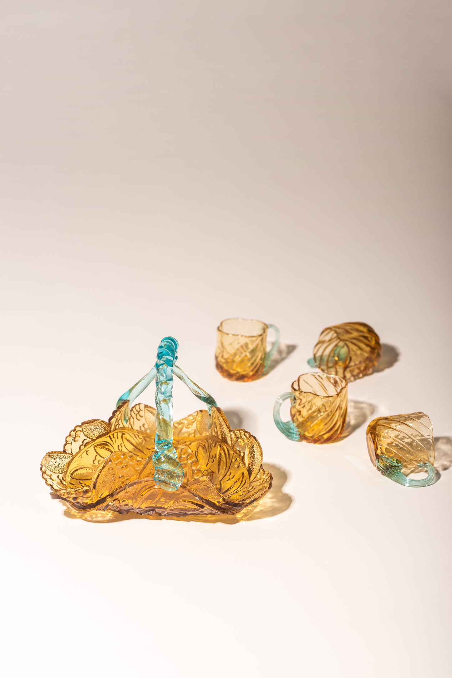 Glass basket and teacups